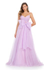 Sparkle all night in this enchanting tulle gown featuring a sweetheart neckline, delicate spaghetti straps, and a statement bow accent for a touch of elegance. Perfect for special occasions.