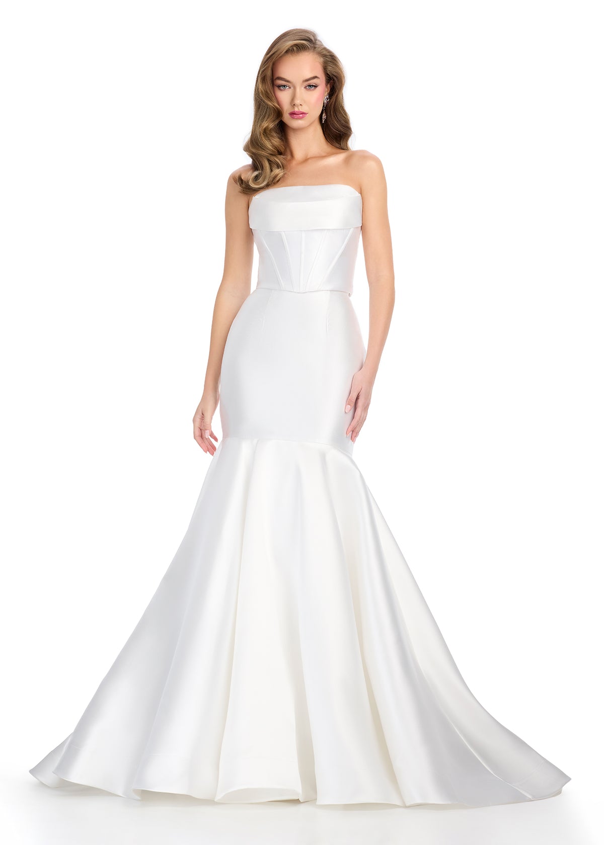 A stunning ASHLEYlauren favorite, this two-piece gown features a structured strapless corset bustier paired with a sleek mikado mermaid skirt. Finished with a sweep train for an elegant and sophisticated look. Perfect for special occasions.