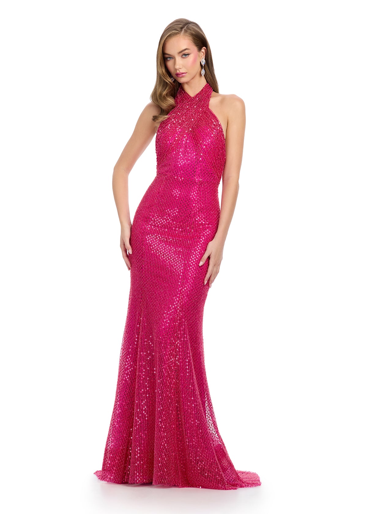 Magical fully beaded gown featuring a criss-cross halter neckline that flows into a stunning low open back. Designed to shimmer from every angle for an unforgettable look. Perfect for special occasions.