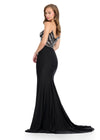 Back -  Sparkling strapless gown featuring a structured bustier adorned with press-on stones in an animal print-inspired pattern. Complete with a wrap skirt, right leg slit, and sweep train for a fierce and glamorous look. Perfect for special occasions.