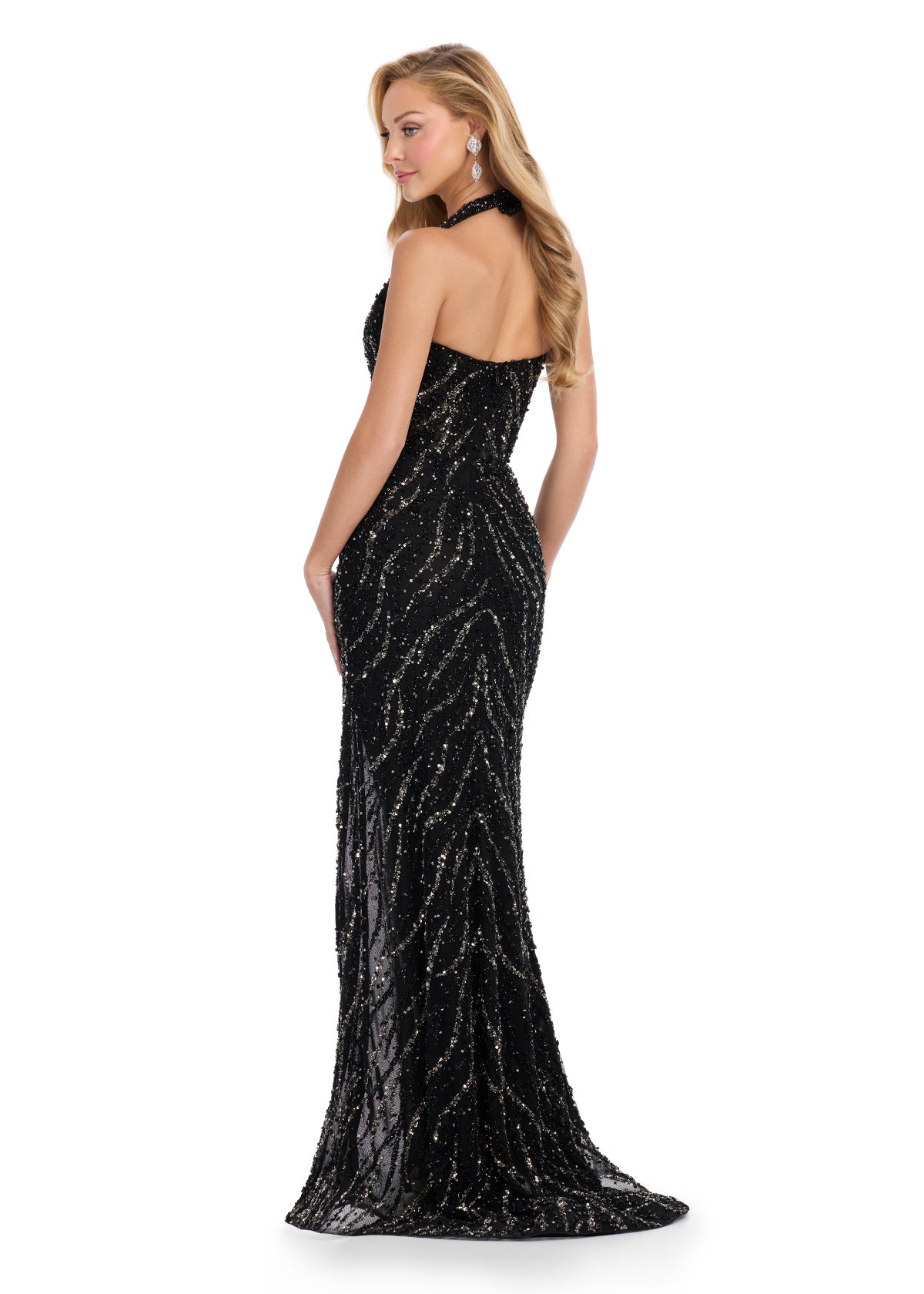 Back - Iconic fully beaded gown featuring an intricate bead design, a stunning halter neckline with a sweetheart shape, and a left leg slit for a glamorous, showstopping look. Perfect for special occasions.