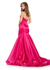 Back - Glamorous satin gown featuring a sweetheart neckline and a statement ruffle back skirt with pick-ups for added drama and elegance. Perfect for making a showstopping entrance.