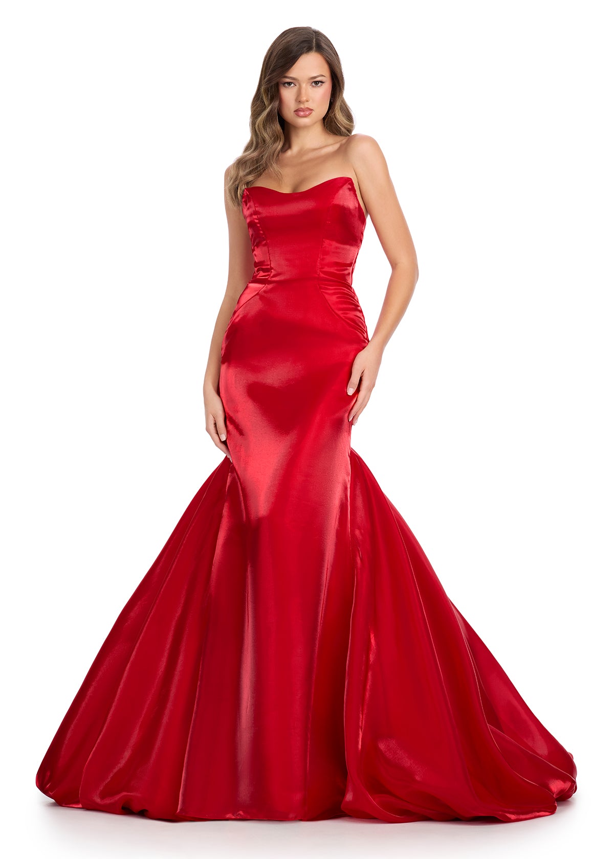 Glamorous satin gown featuring a sweetheart neckline and a statement ruffle back skirt with pick-ups for added drama and elegance. Perfect for making a showstopping entrance.