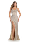 Elegant strapless gown featuring a sweetheart neckline, exposed corset boning, intricate beadwork, and a right leg slit. Finished with fringe detailing for a glamorous touch. Perfect for special occasions.