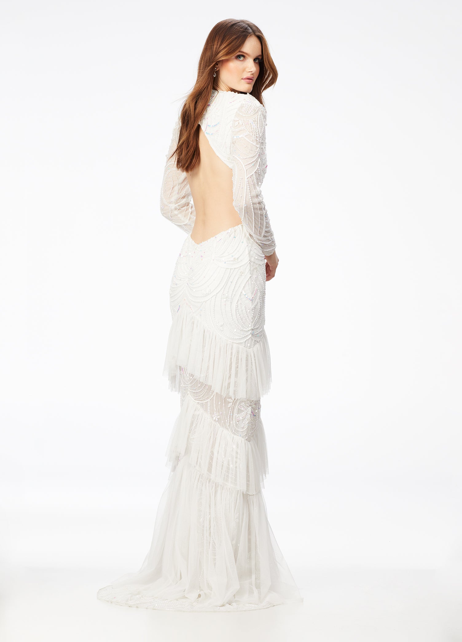 Back - Ivory ASHLEYlauren 11199 – A dramatic v-neck beaded gown featuring long sleeves, ruffle accents, a center slit, and a sweep train. Perfect for making a bold and elegant statement at any special event.



