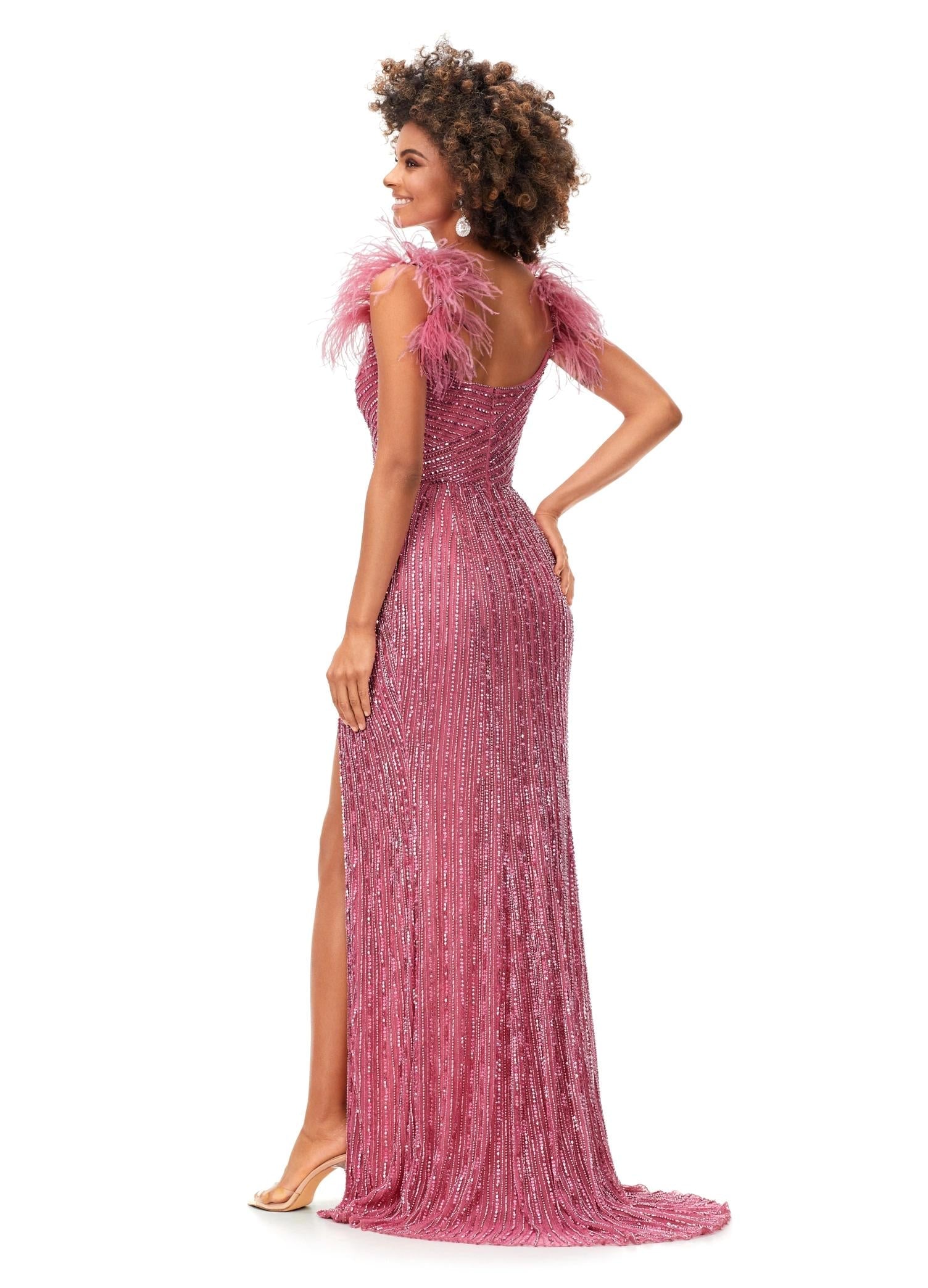 Back - Pink ASHLEYlauren 11367 beaded gown featuring a sweetheart neckline, detachable feather straps, wrap skirt, and left leg slit for an elegant and versatile look.