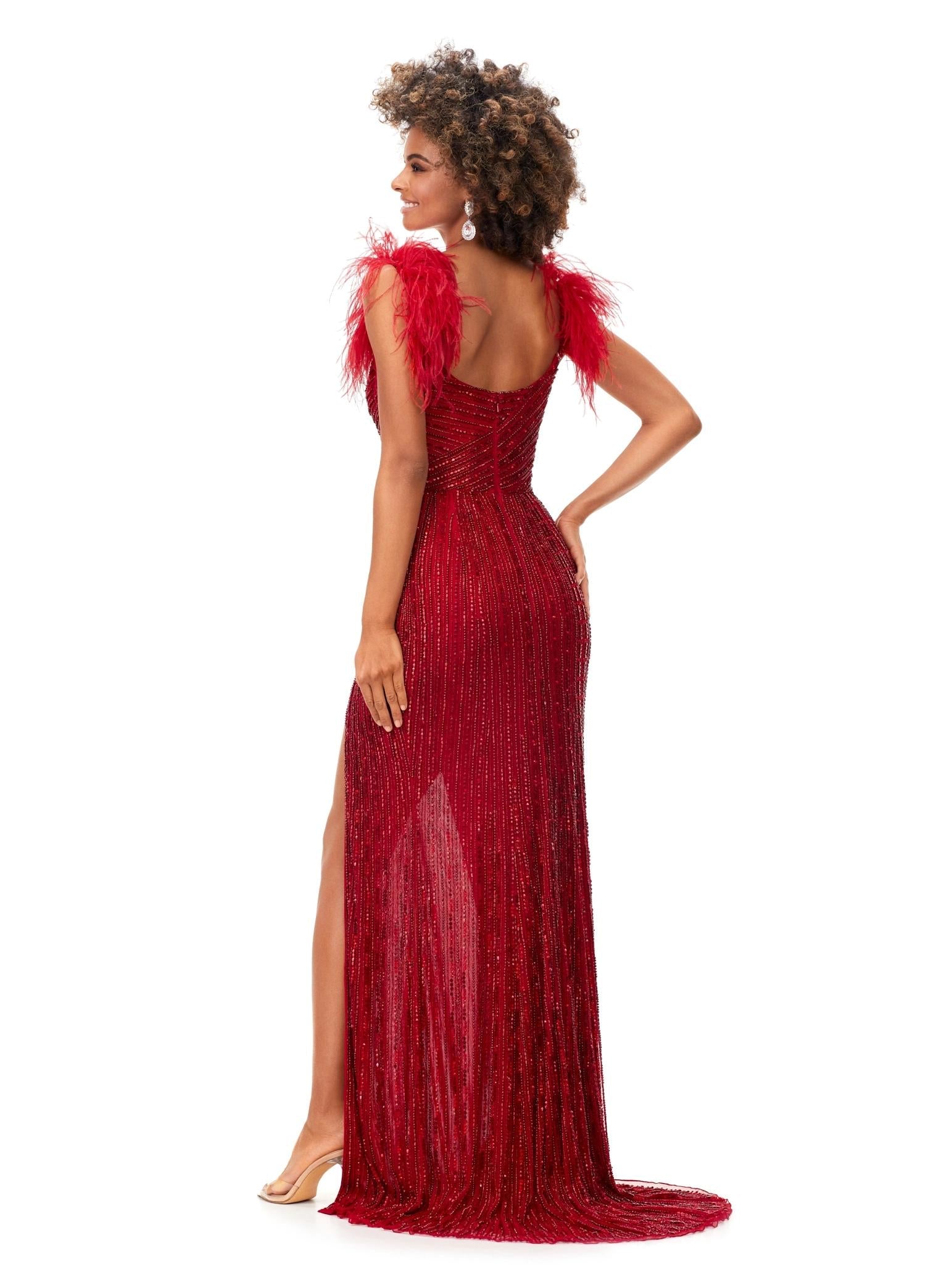 Back - Red ASHLEYlauren 11367 beaded gown featuring a sweetheart neckline, detachable feather straps, wrap skirt, and left leg slit for an elegant and versatile look.