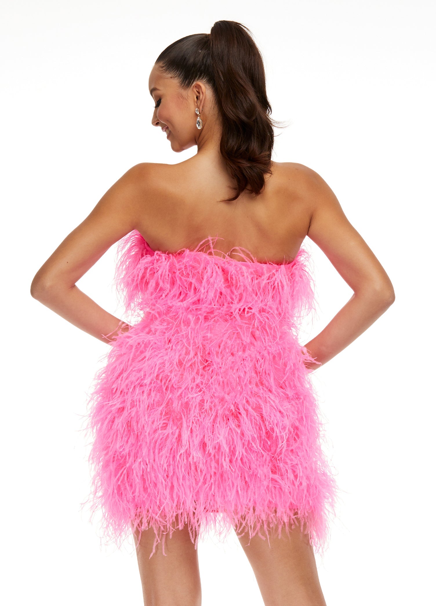 Back - Pink ASHLEYlauren 4467 strapless cocktail dress featuring a fully feathered design and an oversized bow detail at the waist for a flirty and standout look.