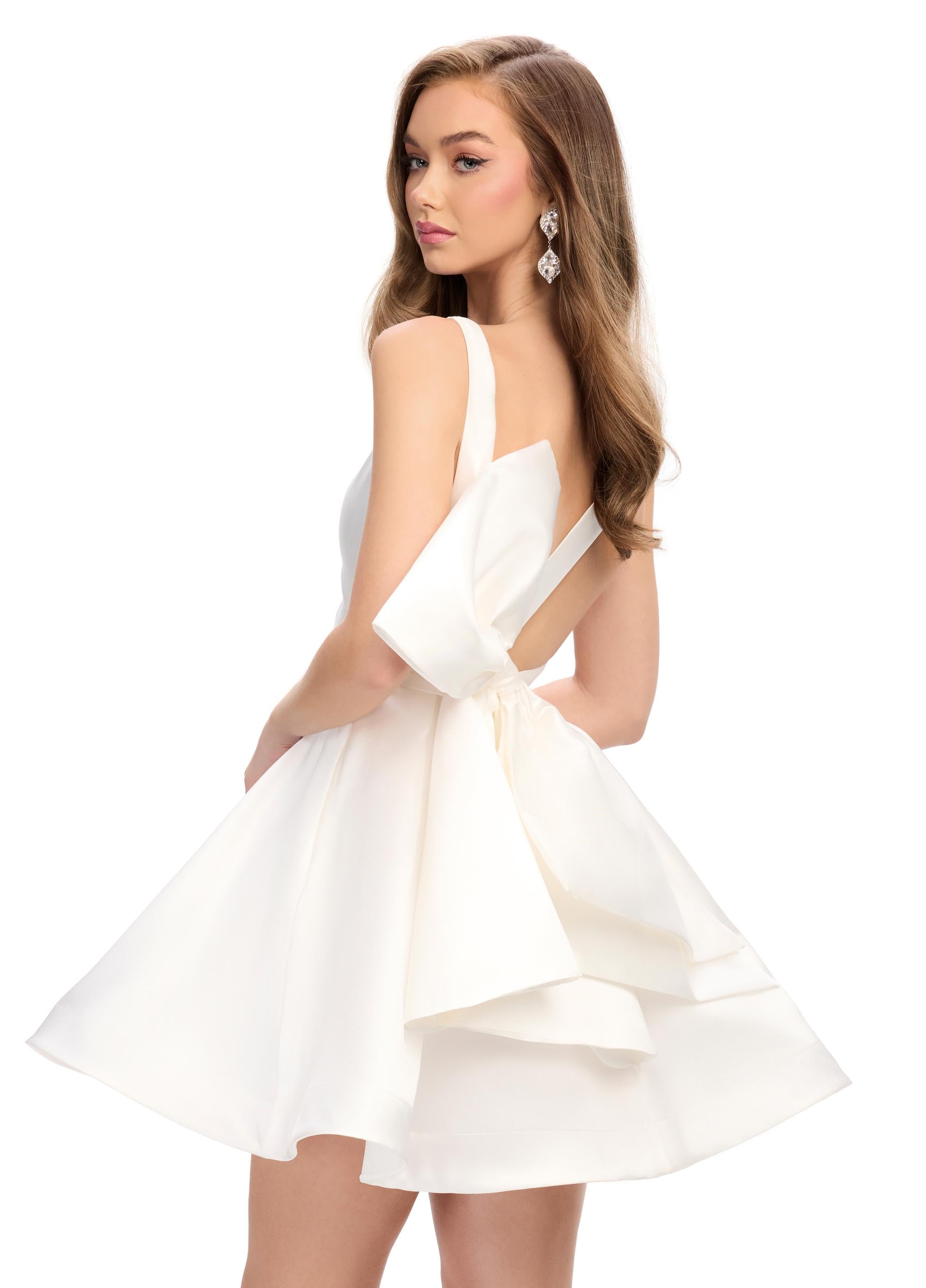 Back - White ASHLEYlauren 4781 Mikado cocktail dress featuring a deep V-neckline, open back with an inverted bow detail, and an A-line skirt for a chic and elegant statement look.