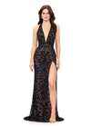 Black ASHLEYlauren 11283 halter gown featuring a V-neckline, open back, intricate beading throughout, and a left leg slit.