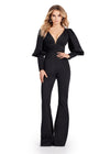 Black ASHLEYlauren 11533 scuba jumpsuit featuring a V-neckline, dramatic bishop puff sleeves, and a sleek, tailored fit for a bold and sophisticated look.