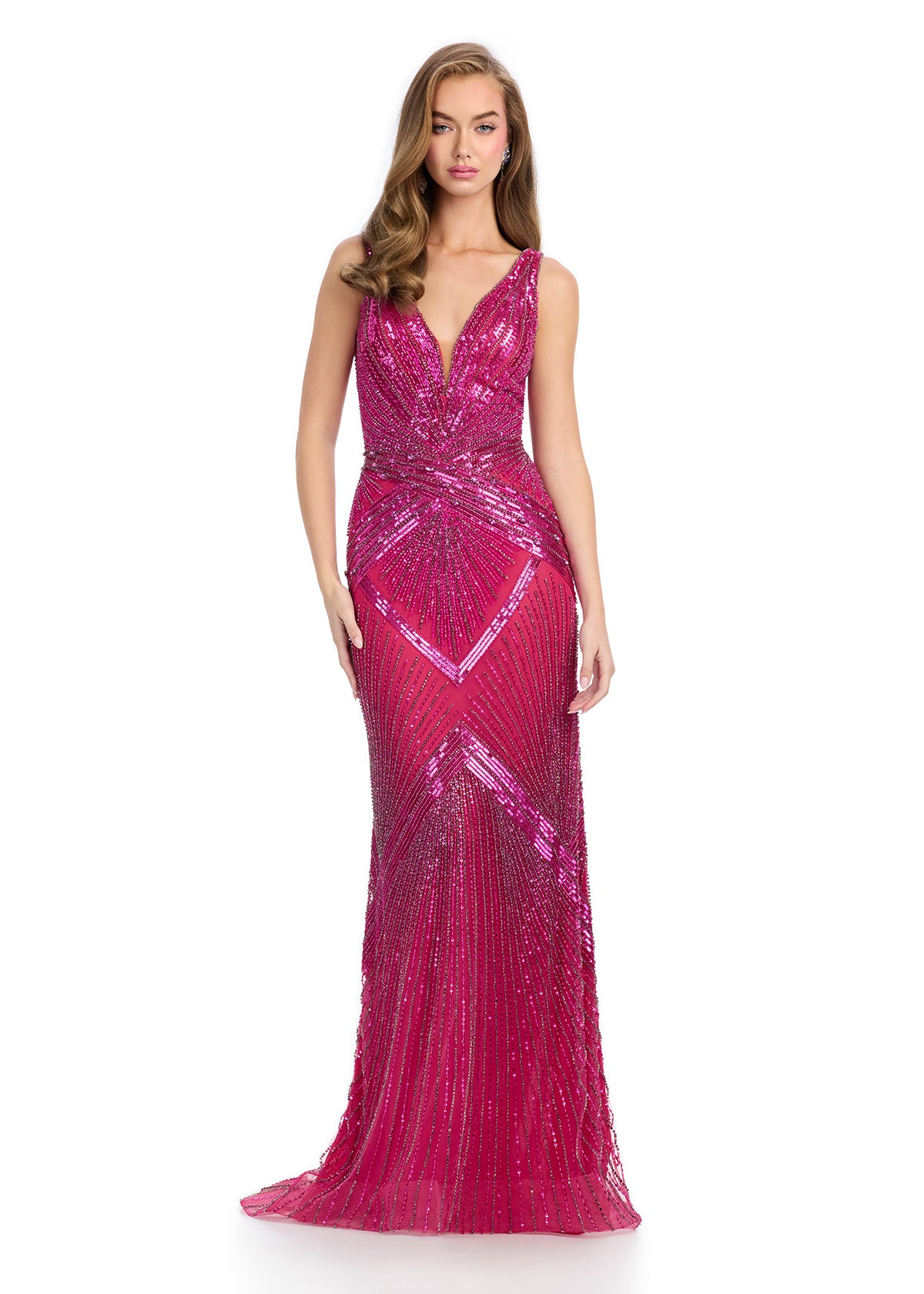 Elegant fully beaded gown featuring a stunning V-neckline, open V-back, and intricate beadwork that catches the light from every angle. Finished with a sweep train for a glamorous, showstopping look. Perfect for special occasions.