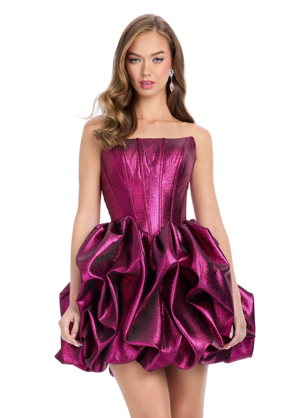 ASHLEYlauren 4789 – A stunning strapless metallic cocktail dress with corset detailing, a pick-up skirt, and a full ruffle design. Perfect for making a fabulous statement at your next event.