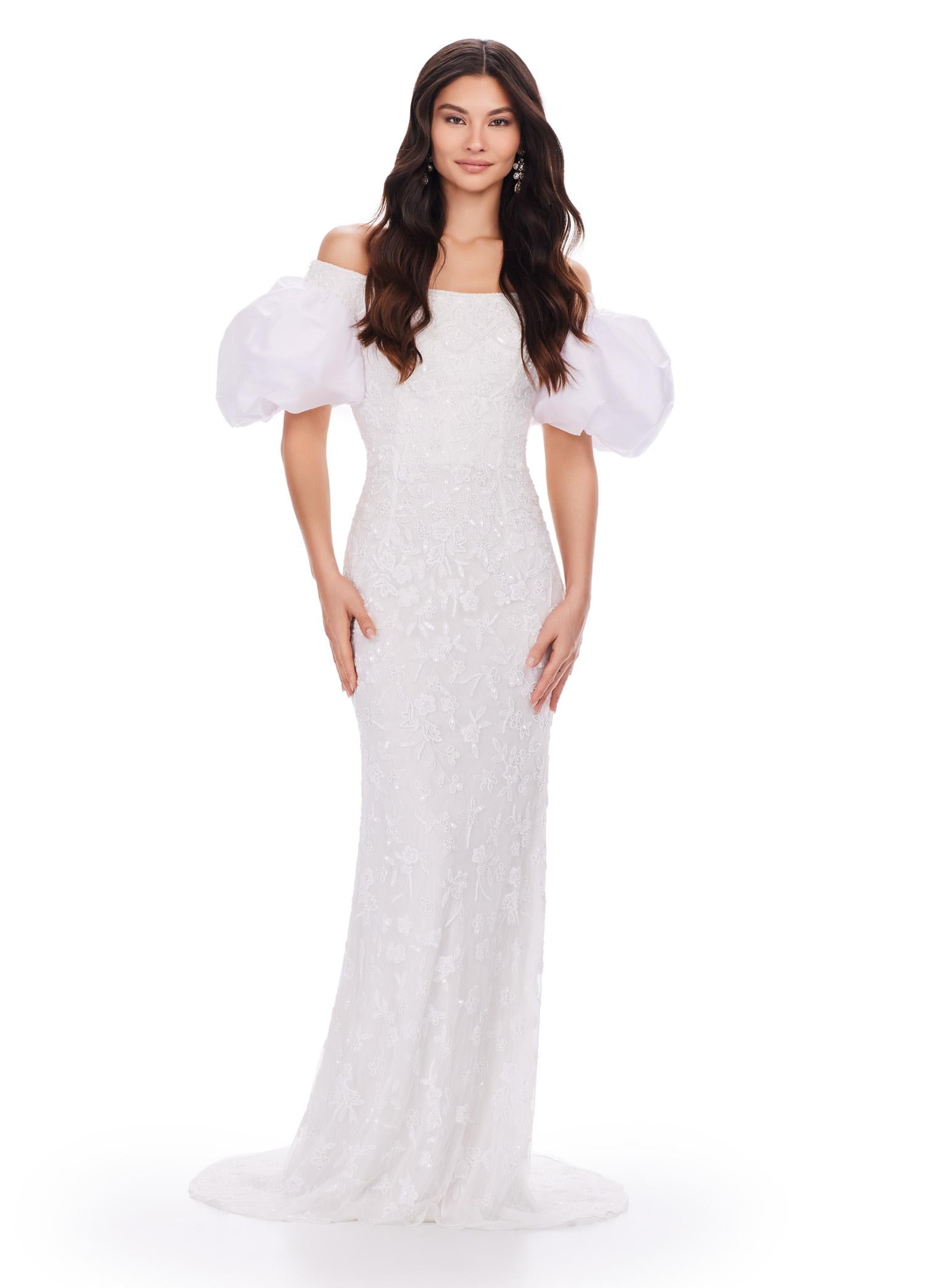 Ivory ASHLEYlauren 11432 fully beaded gown featuring an off-shoulder neckline and glamorous taffeta puff sleeves for an elegant and statement-making look.