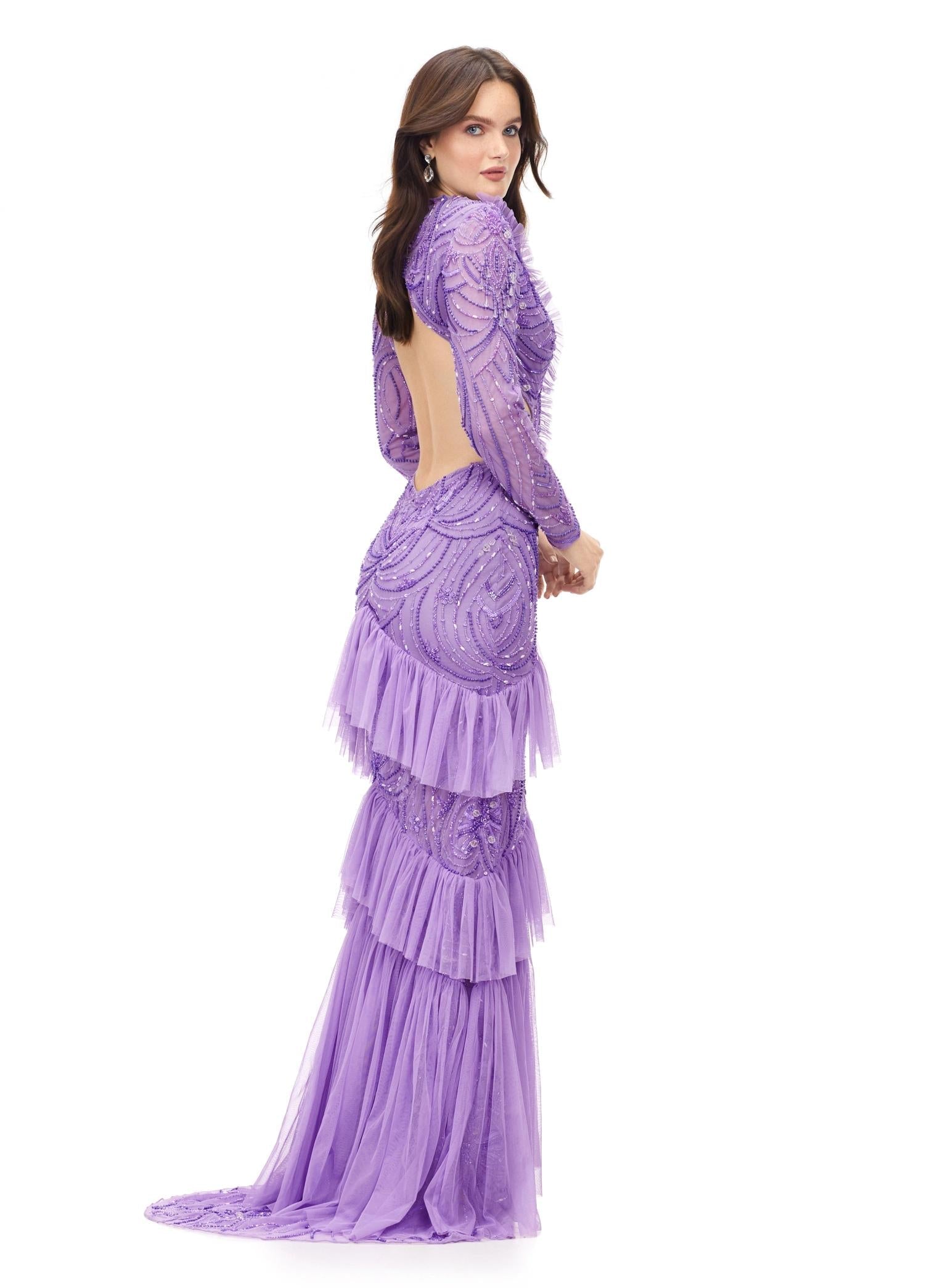 Back - Lilac ASHLEYlauren 11199 – A dramatic v-neck beaded gown featuring long sleeves, ruffle accents, a center slit, and a sweep train. Perfect for making a bold and elegant statement at any special event.



