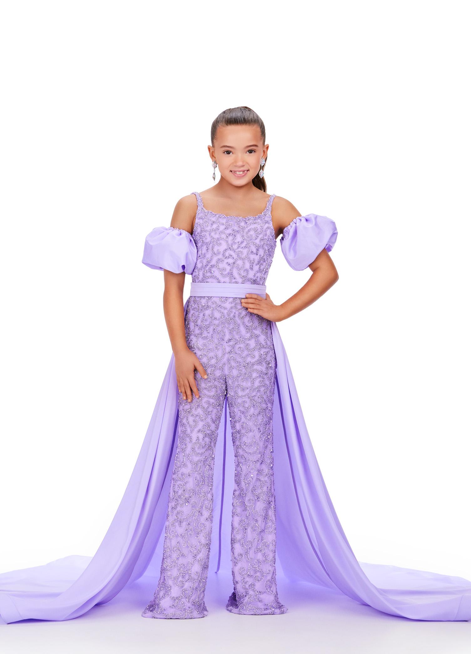 Lilac ASHLEYlauren 8269 fully beaded kids jumpsuit featuring a square neckline, dramatic removable taffeta puff sleeves, and a detachable taffeta overskirt for a bold and versatile statement look.