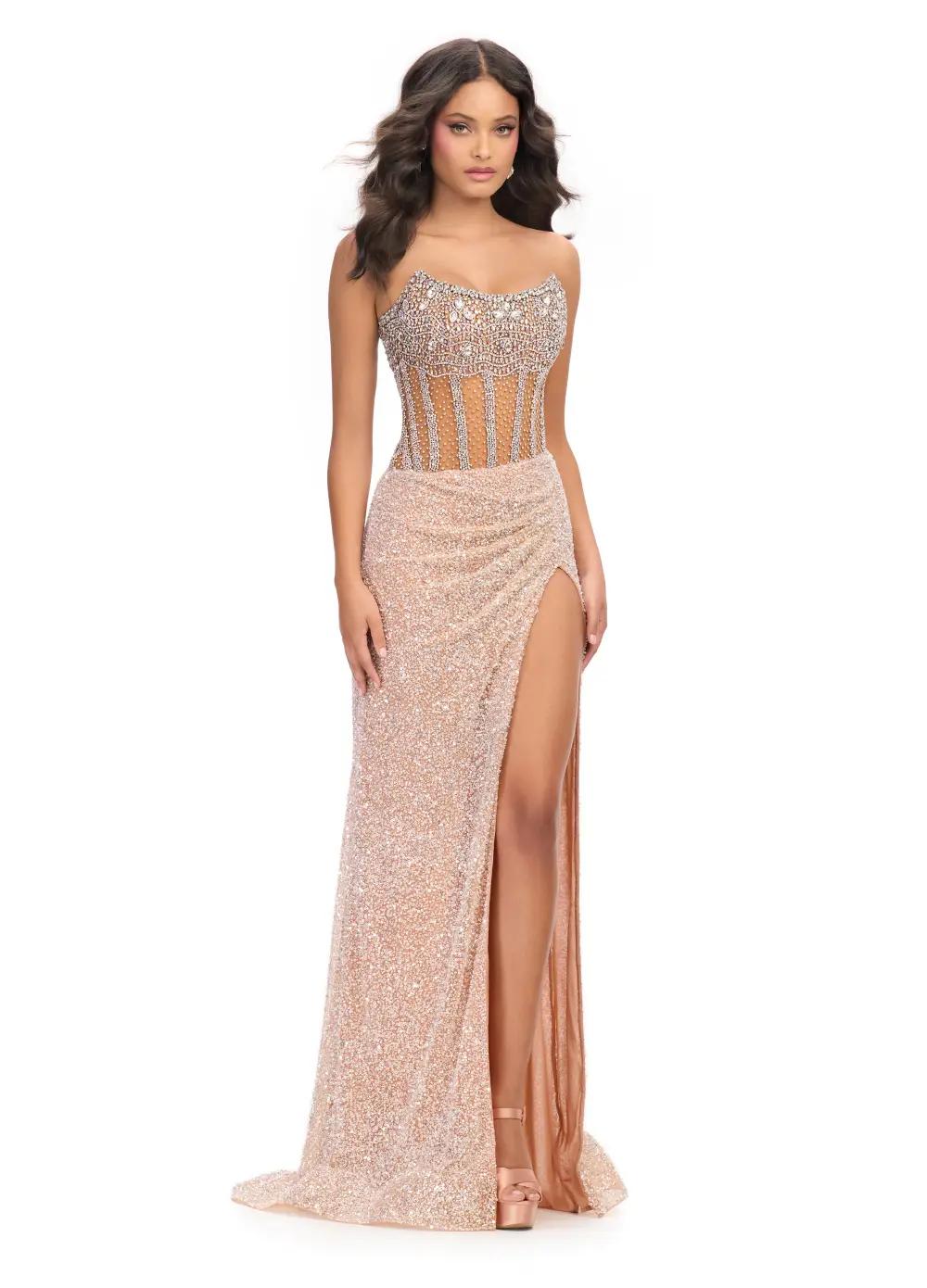 Nude ASHLEYlauren 11830 dazzling fully hand-beaded gown featuring a sweetheart neckline, corset bustier, left leg slit, and a horsehair-trimmed skirt for a glamorous and elegant look.