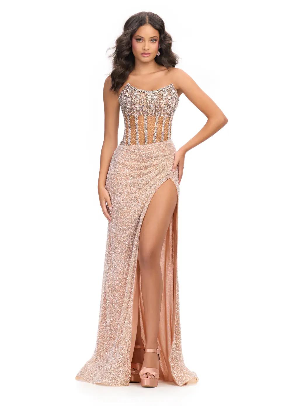 Nude ASHLEYlauren 11830 dazzling fully hand-beaded gown featuring a sweetheart neckline, corset bustier, left leg slit, and a horsehair-trimmed skirt for a glamorous and elegant look.