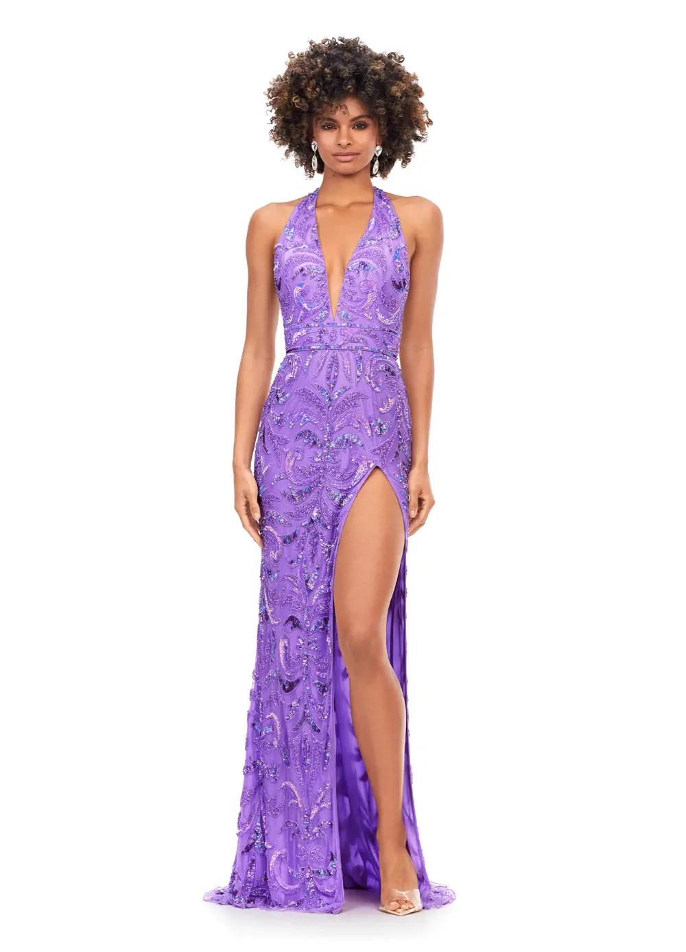 Orchid ASHLEYlauren 11283 halter gown featuring a V-neckline, open back, intricate beading throughout, and a left leg slit.