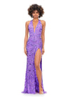 Orchid ASHLEYlauren 11283 halter gown featuring a V-neckline, open back, intricate beading throughout, and a left leg slit.