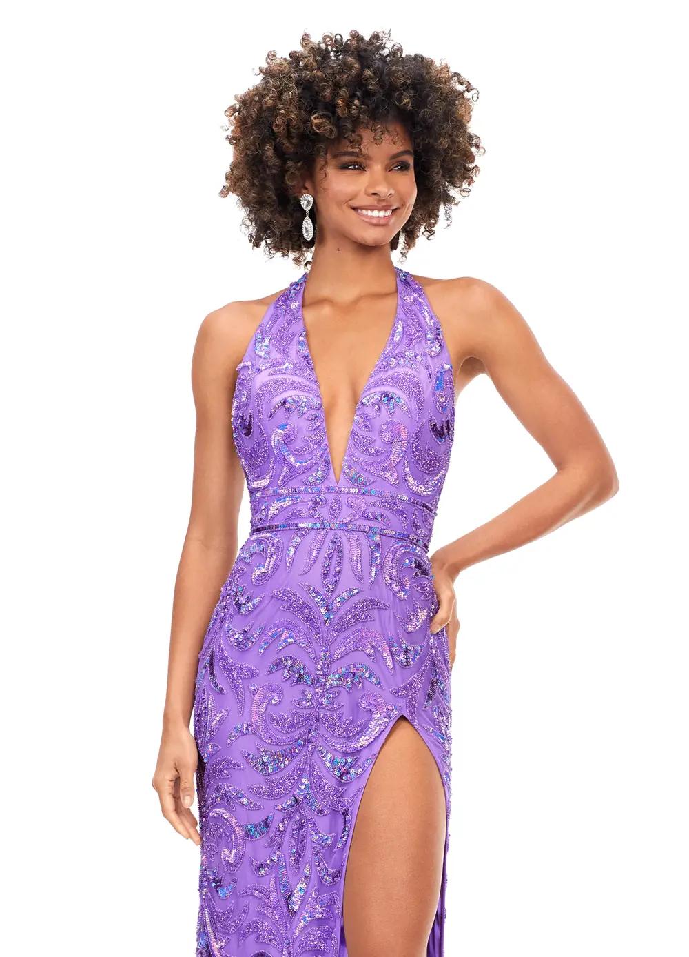 Orchid ASHLEYlauren 11283 halter gown featuring a V-neckline, open back, intricate beading throughout, and a left leg slit.