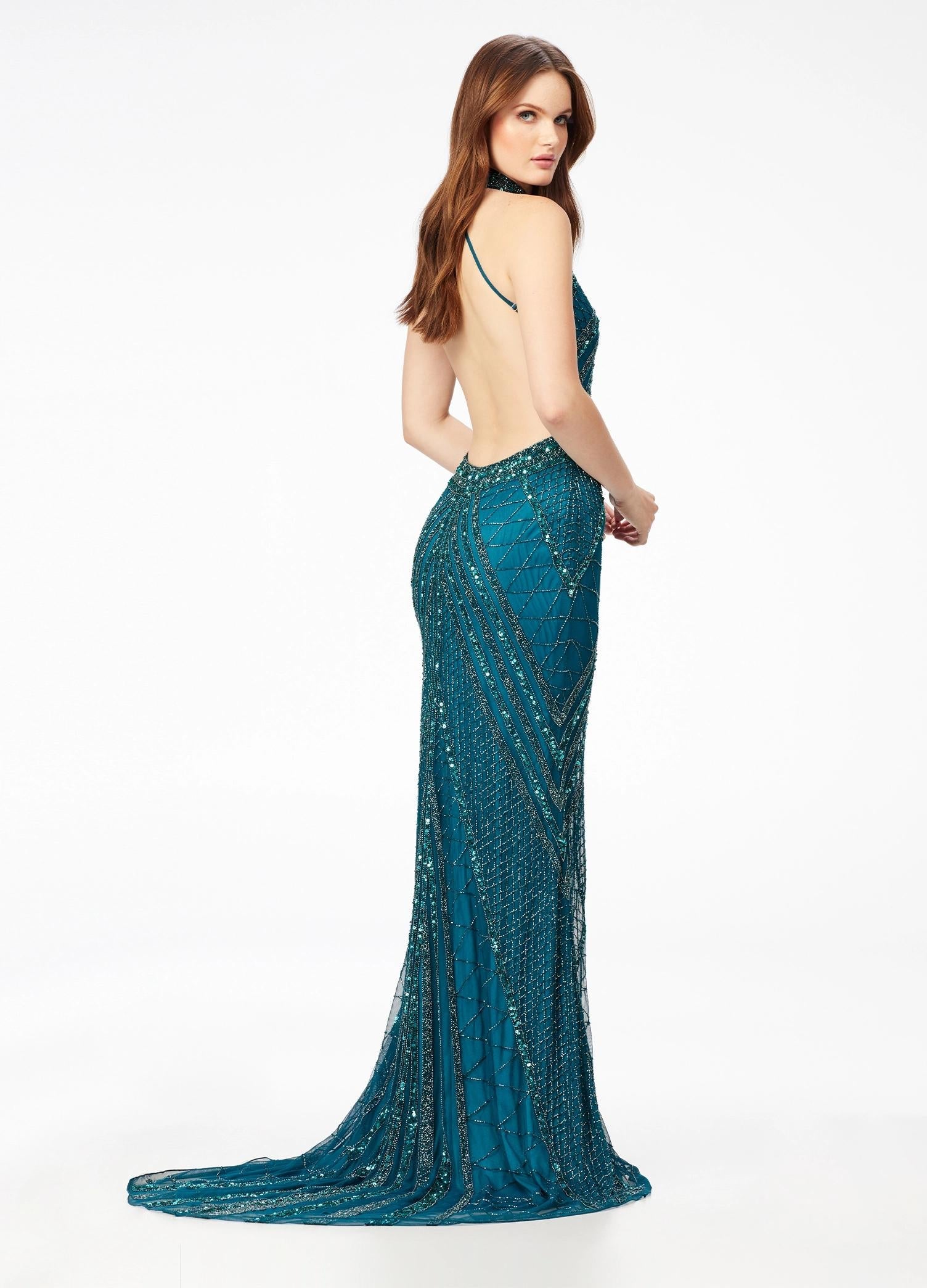 Back - ASHLEYlauren 11177 – An intricately hand-beaded halter gown featuring a stunning beaded motif, low open back, center slit, and a sweeping train. Perfect for making a show-stopping statement at any event.