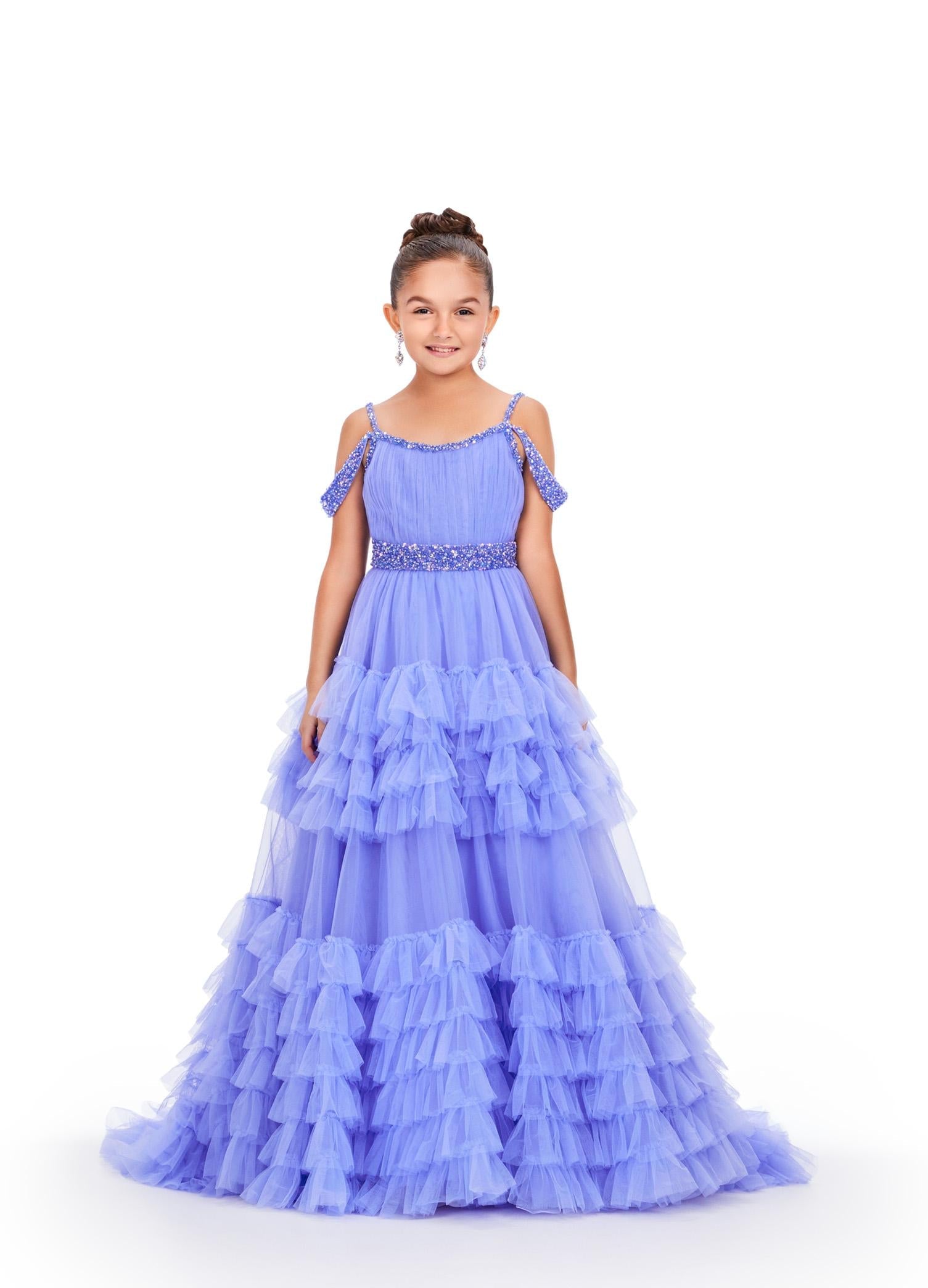 Periwinkle ASHLEYlauren 8261 kids ball gown featuring a beaded scoop neckline, V-back, off-the-shoulder draping straps, and a dramatic tiered tulle skirt with a sweeping train for an enchanting and elegant look.