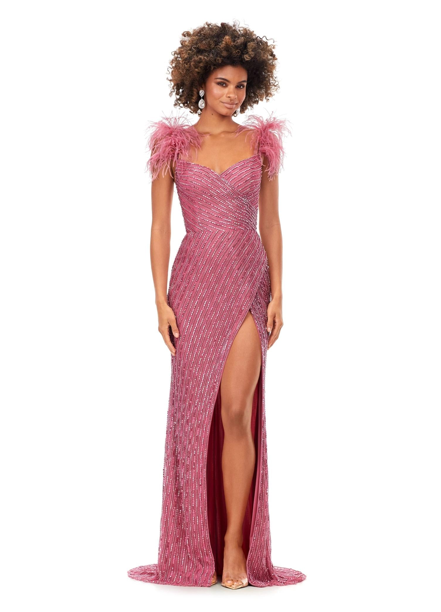 Pink ASHLEYlauren 11367 beaded gown featuring a sweetheart neckline, detachable feather straps, wrap skirt, and left leg slit for an elegant and versatile look.