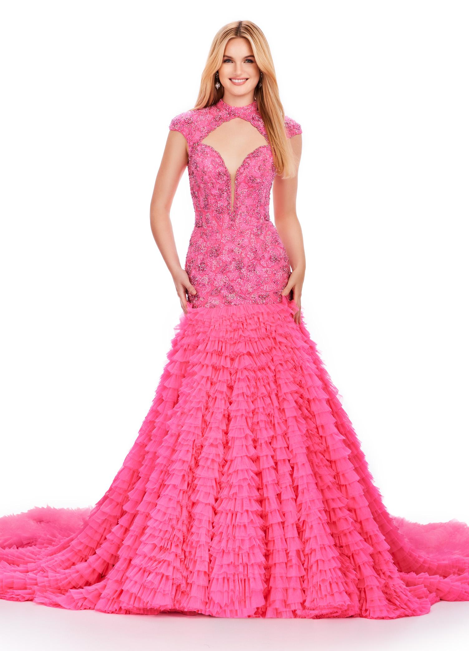 Pink ASHLEYlauren 11428 breathtaking mermaid gown featuring a fully beaded drop waist bustier, open back, cap sleeves, and a dramatic tiered ruffle tulle skirt for an unforgettable look.