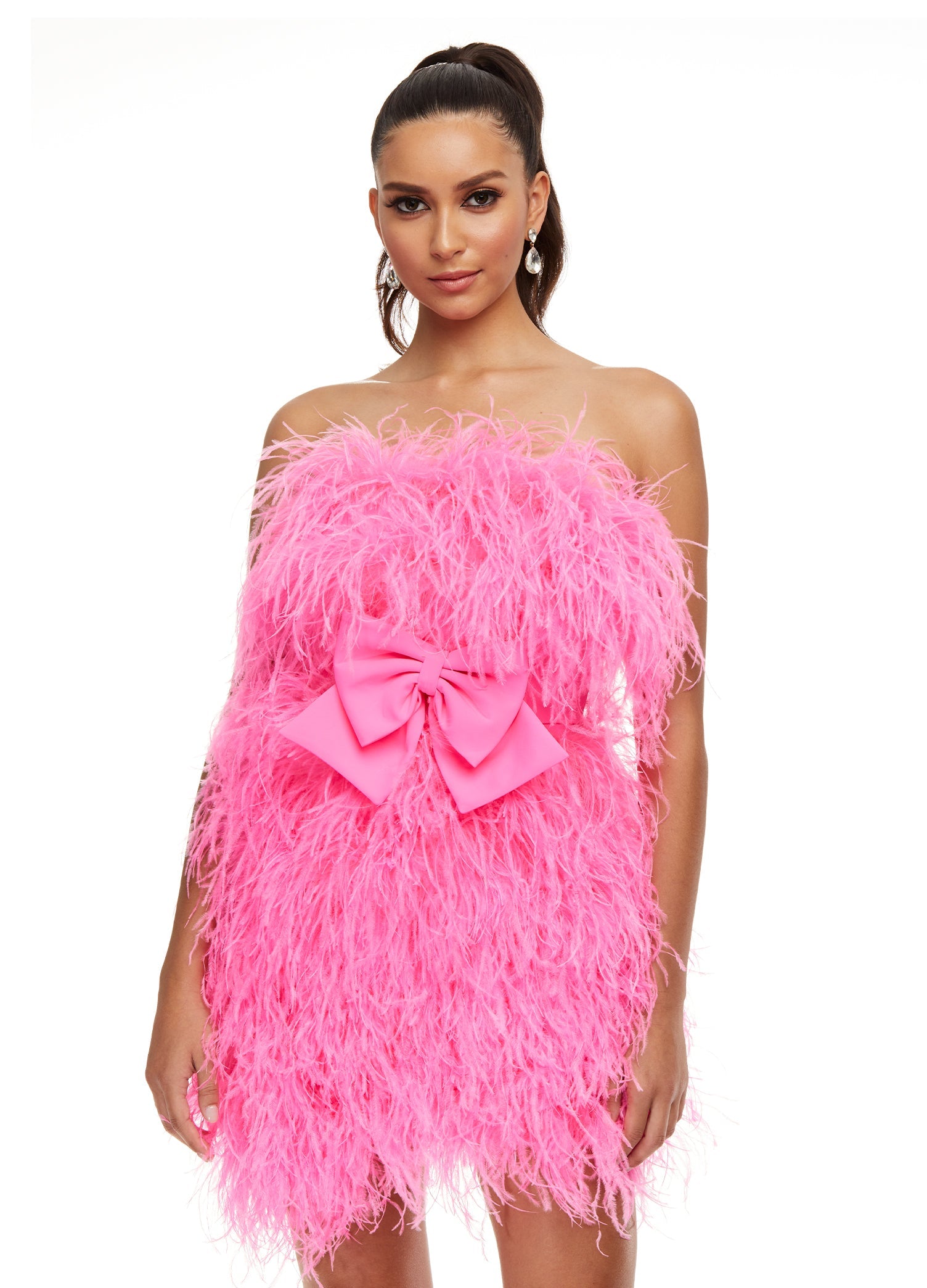 Pink ASHLEYlauren 4467 strapless cocktail dress featuring a fully feathered design and an oversized bow detail at the waist for a flirty and standout look.