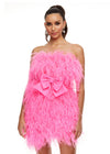 Pink ASHLEYlauren 4467 strapless cocktail dress featuring a fully feathered design and an oversized bow detail at the waist for a flirty and standout look.