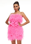 Pink ASHLEYlauren 4467 strapless cocktail dress featuring a fully feathered design and an oversized bow detail at the waist for a flirty and standout look.