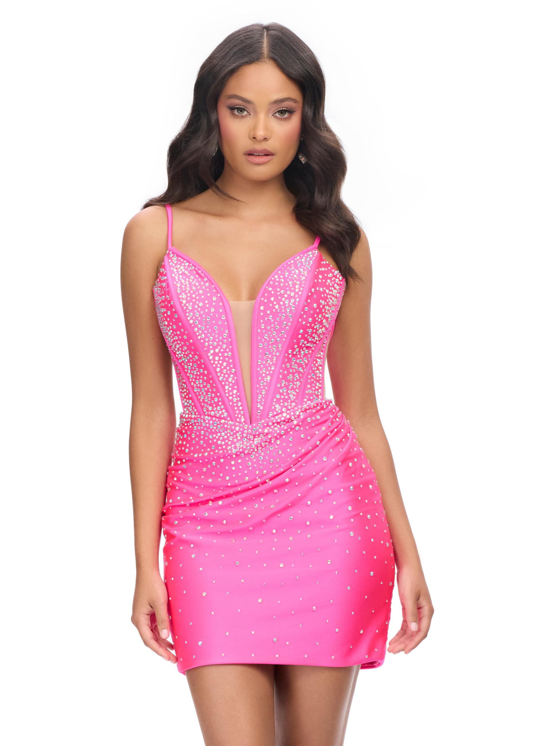 Pink ASHLEYlauren 4693 cocktail dress featuring spaghetti straps, an illusion V-neckline, corset bustier, press-on stone embellishments, and a fitted skirt for a glamorous and head-turning look.