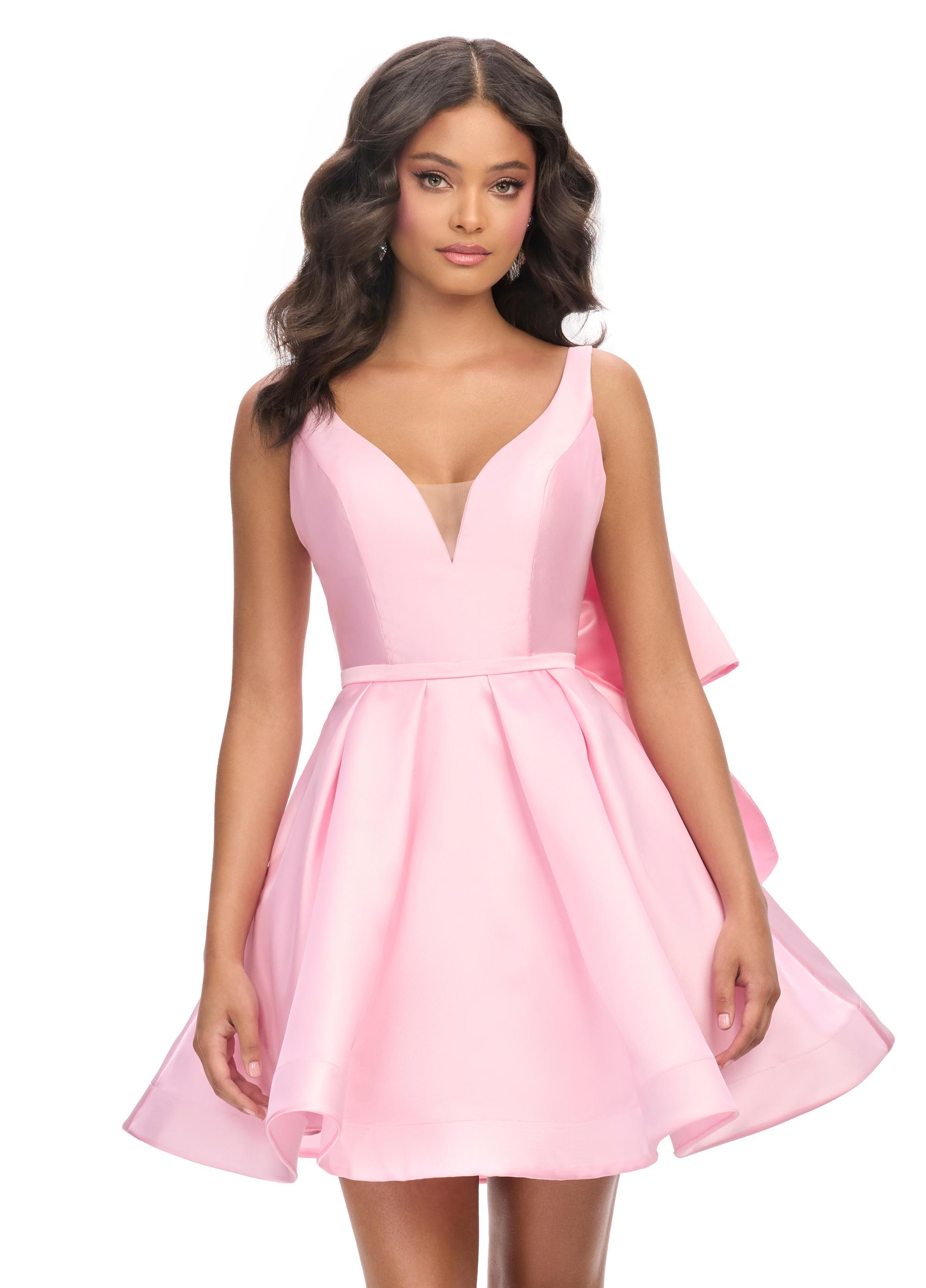 Pink ASHLEYlauren 4781 Mikado cocktail dress featuring a deep V-neckline, open back with an inverted bow detail, and an A-line skirt for a chic and elegant statement look.