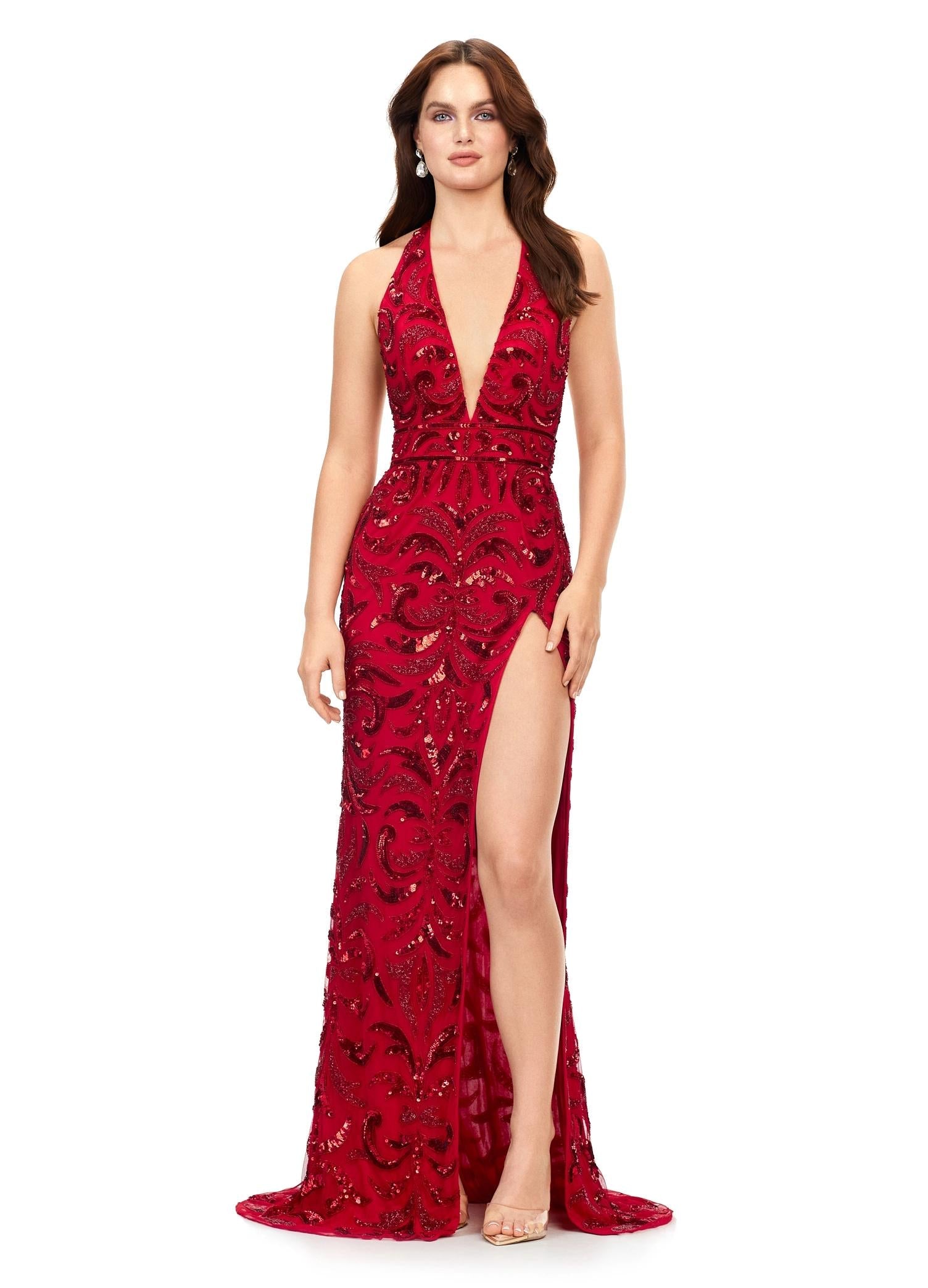 Red ASHLEYlauren 11283 halter gown featuring a V-neckline, open back, intricate beading throughout, and a left leg slit.