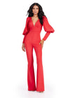 Red ASHLEYlauren 11533 scuba jumpsuit featuring a V-neckline, dramatic bishop puff sleeves, and a sleek, tailored fit for a bold and sophisticated look.