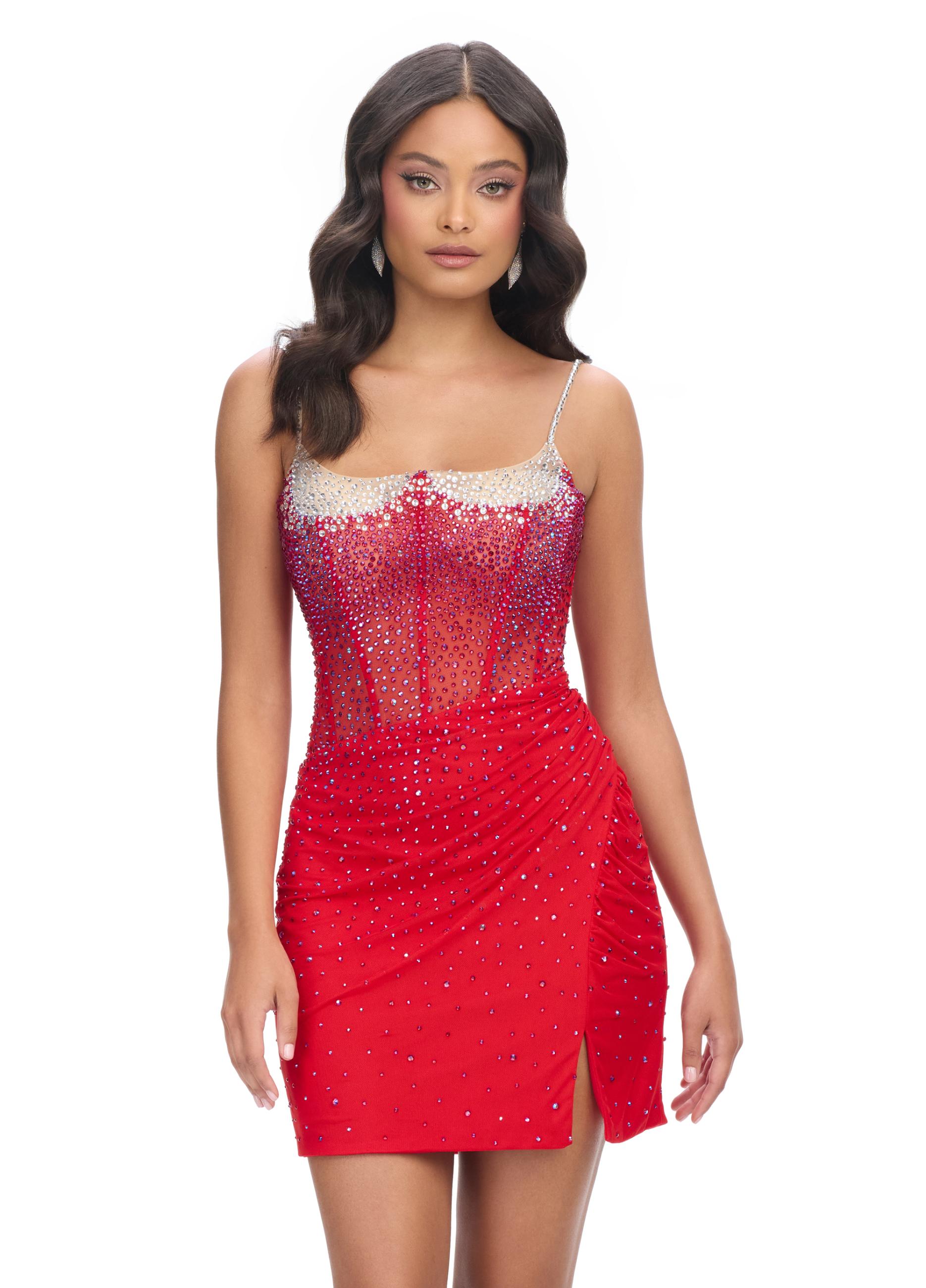 Red ASHLEYlauren 4690 stunning cocktail dress featuring an illusion neckline, corset bustier with press-on stones cascading down the skirt, and a wrap skirt with a side slit for an elegant and head-turning look.