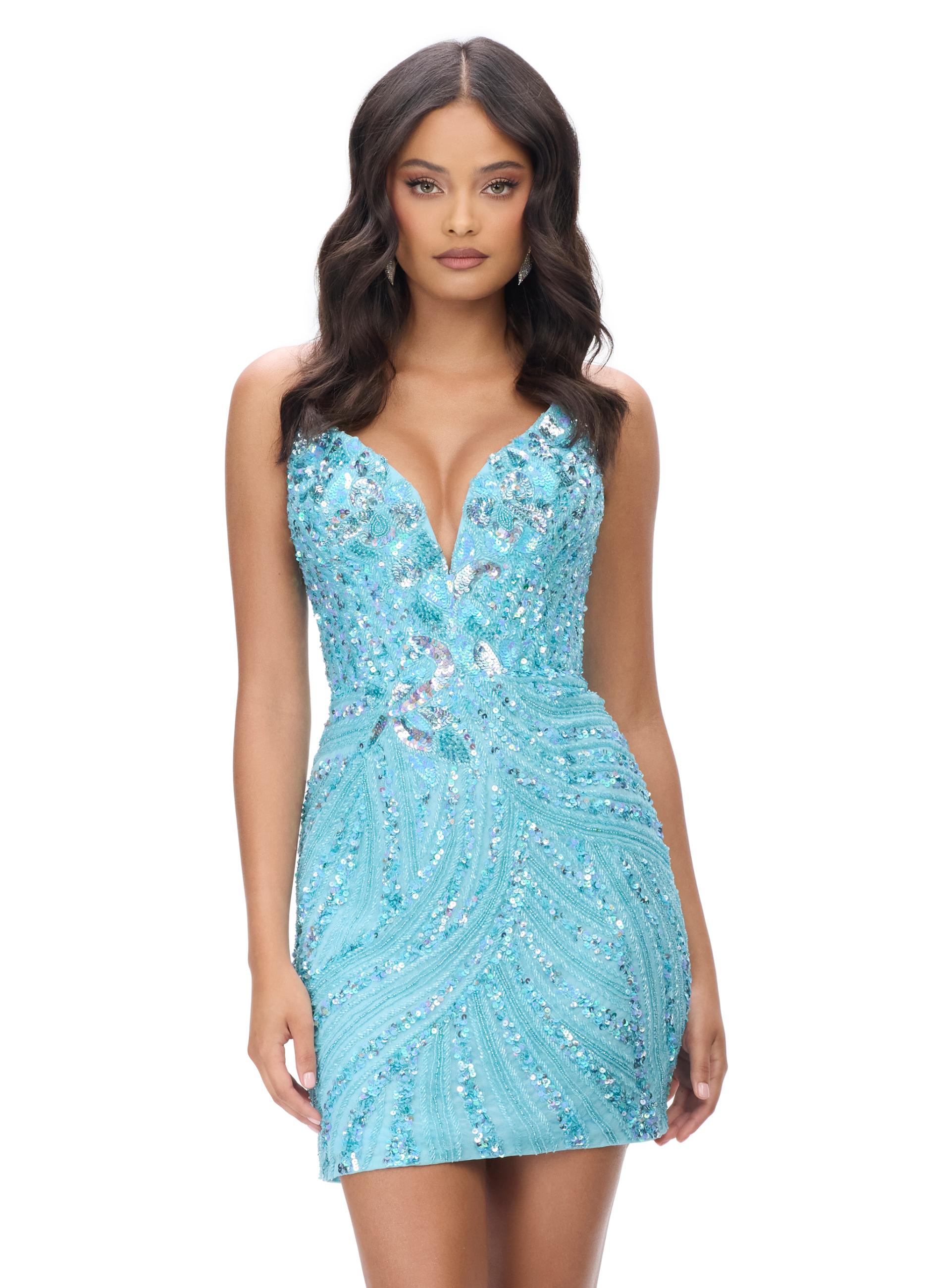 Sky ASHLEYlauren 4500 strapless gown featuring a plunging V-neckline, ornate sequin bead pattern, and striking V-back for a bold and glamorous look. 