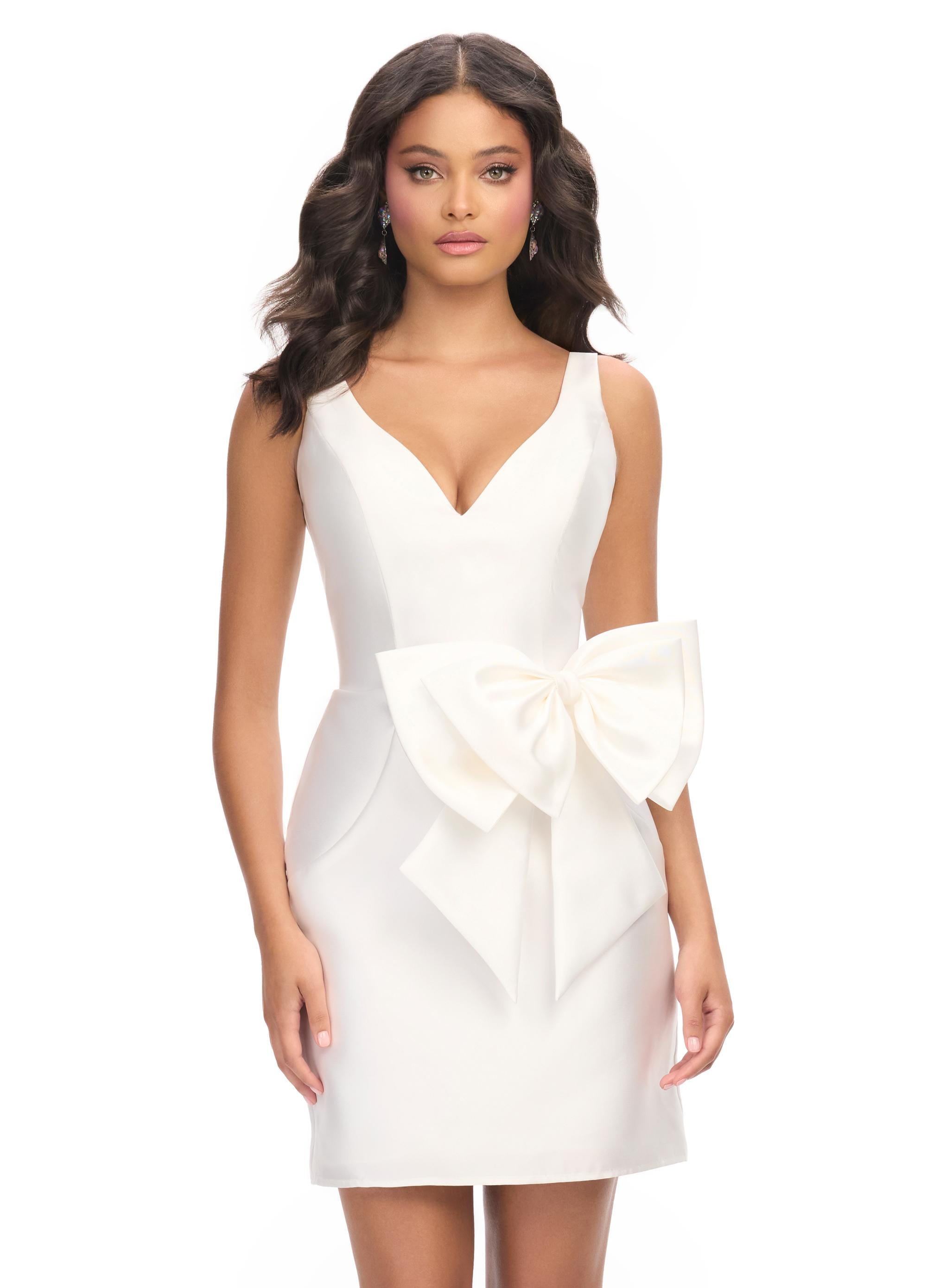 White ASHLEYlauren 4785 Mikado cocktail dress featuring a plunging V-neckline, elegant V-back, fitted skirt, and an oversized bow accent for a sophisticated and show-stopping look.