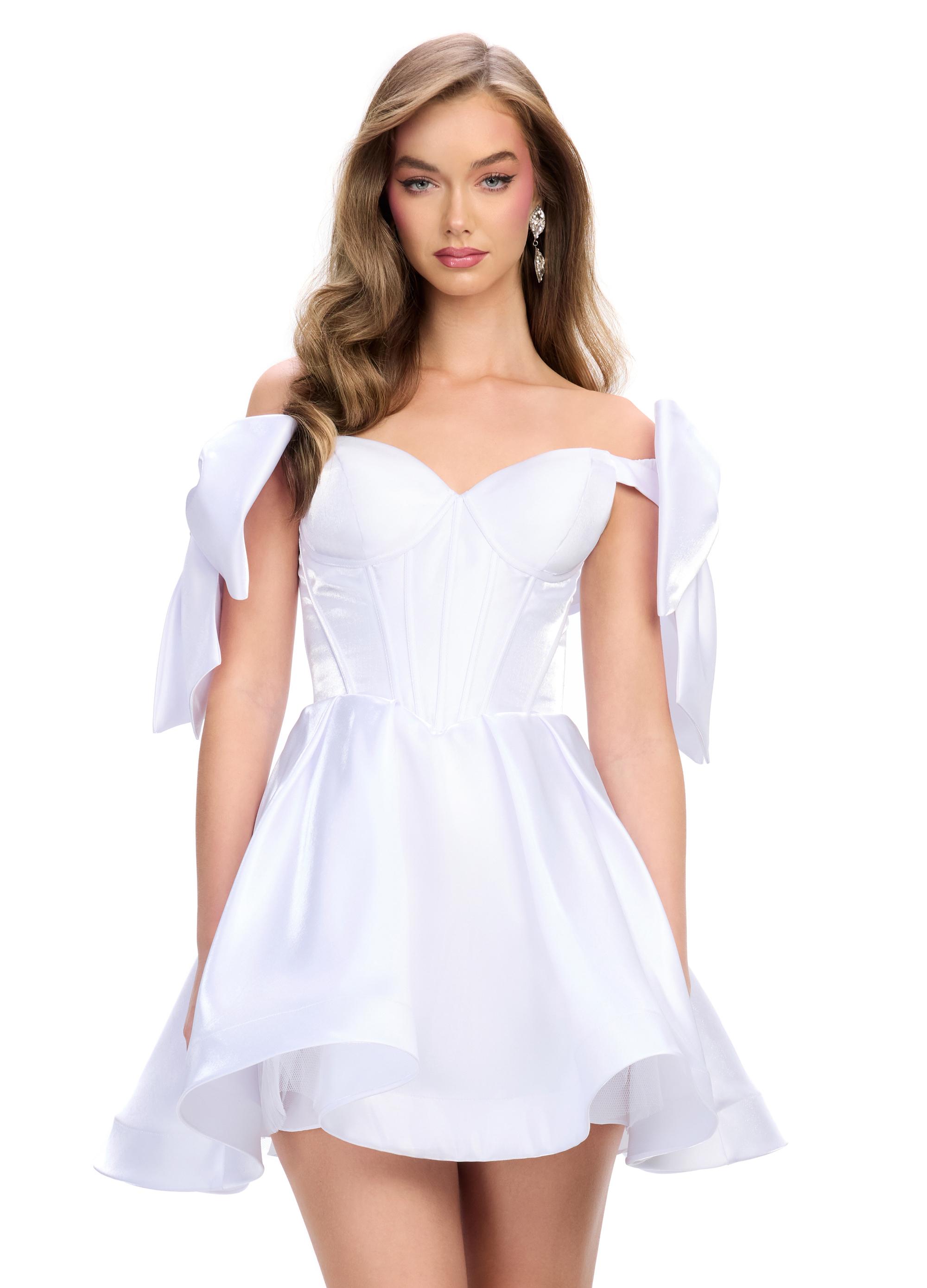 White ASHLEYlauren 4788 satin cocktail dress featuring a sweetheart neckline, off shoulder bow details, corset bustier, and a full A-line skirt for a dainty, elegant, and timeless look.