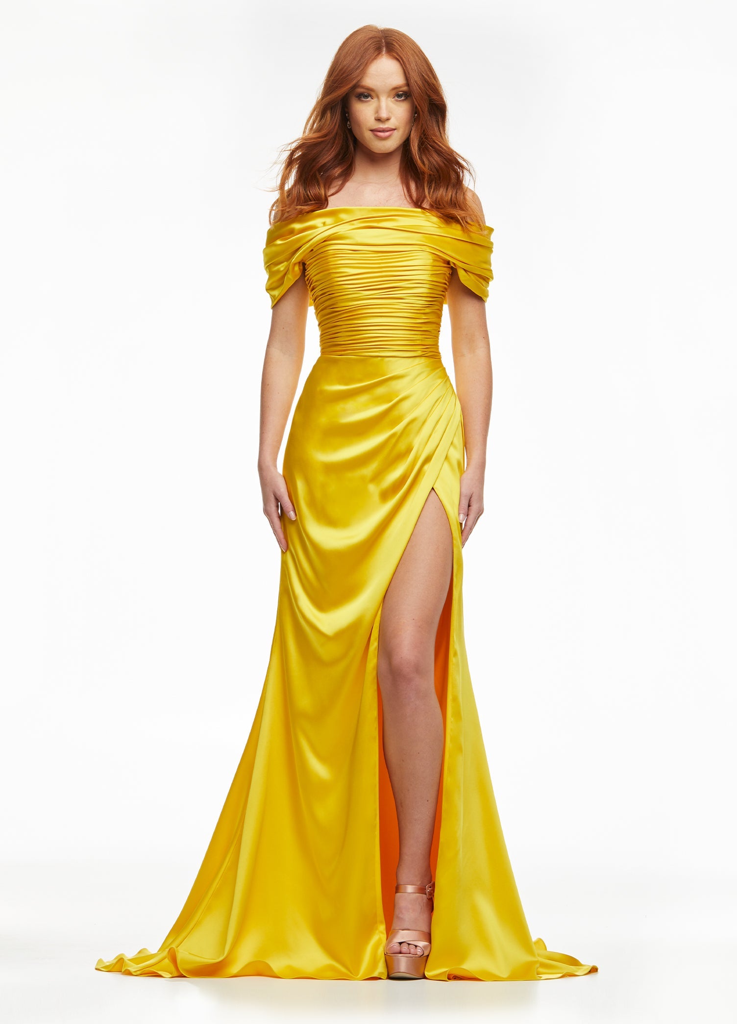 Yellow ASHLEYlauren 11093 – A stunning off-shoulder satin gown featuring a ruched bustier, flattering wrap skirt, ruched back, and left leg slit. The perfect combination of elegance and style to showcase your figure.