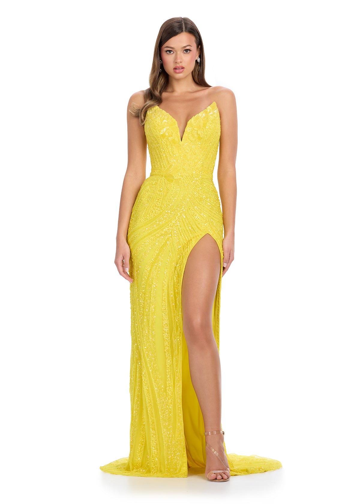 Yellow ASHLEYlauren 11236 strapless gown featuring a sweetheart neckline, modern floral sequin motif cascading down the bustier and skirt, and a left leg slit for a glamorous and head-turning look.