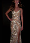 Video - : Dazzling fitted gown featuring a strapless sweetheart neckline, intricate beadwork that shimmers from every angle, and a left leg slit for a striking and glamorous look. Perfect for special occasions.