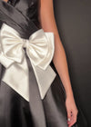 Video - Black ASHLEYlauren 4783 Mikado cocktail dress featuring a sweetheart neckline, an elegant A-line skirt, and an oversized bow accent for a show-stopping and sophisticated look.