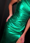 Video - Glamorous one-shoulder metallic gown featuring a ruched bustier for a flattering fit and a left leg slit for a bold, elegant touch. Perfect for making a statement at any special occasion.