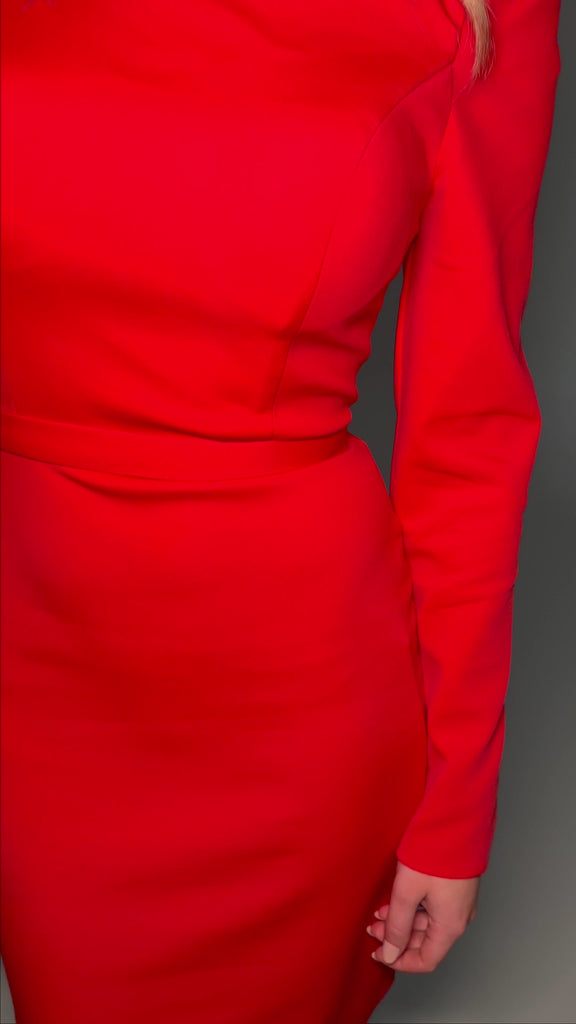 Video -  Red ASHLEYlauren 4674 fitted scuba cocktail dress featuring an asymmetrical neckline, long sleeves, and a classic waistband detail for a sleek and sophisticated look.