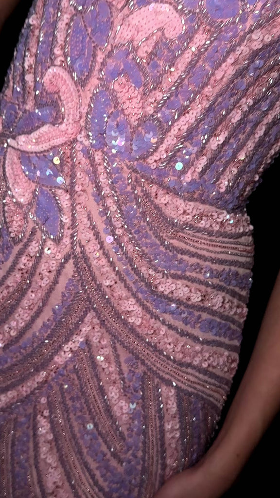 Video -Lilac/Pink ASHLEYlauren 4500 strapless gown featuring a plunging V-neckline, ornate sequin bead pattern, and striking V-back for a bold and glamorous look. 